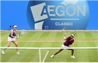 BIRMINGHAM, ENGLAND - JUNE 15:  Raquel Kops-Jones and Abigail Spears (L) of the United States in action during the Doubles Final during Day Seven of the Aegon Classic at Edgbaston Priory Club on June 15, 2014 in Birmingham, England.  (Photo by Tom Dulat/Getty Images)